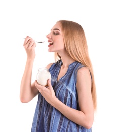 Young woman with yogurt on white background