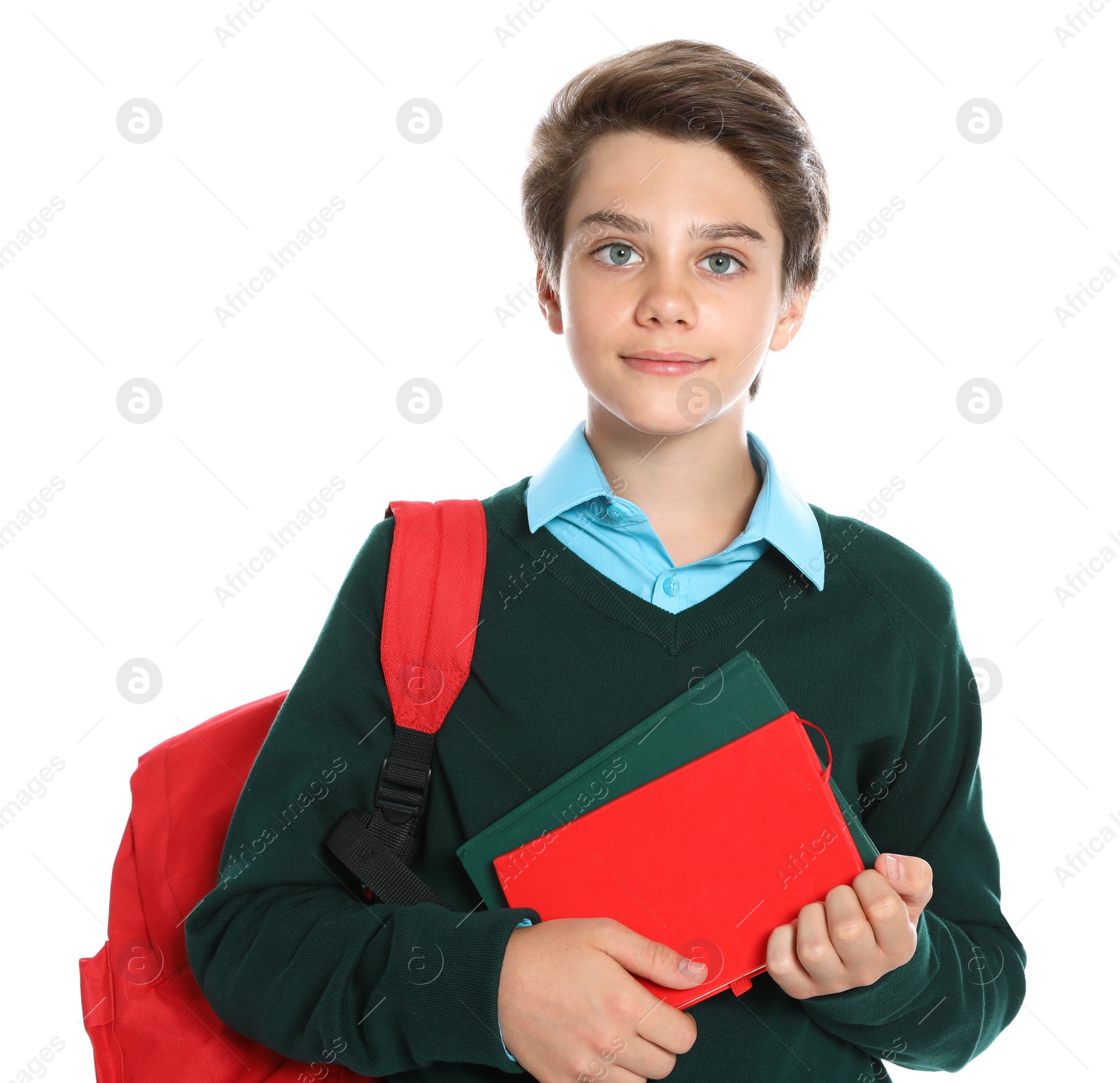 Photo of Happy boy in school uniform on white background