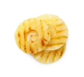 Photo of Tasty grilled pineapple slices isolated on white, top view