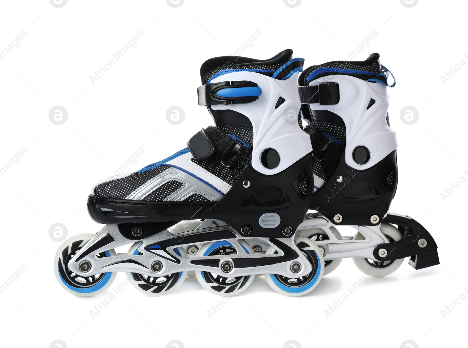 Photo of Pair of inline roller skates on white background