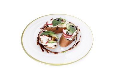 Photo of Delicious bruschettas with cream cheese, vegetables and balsamic vinegar isolated on white