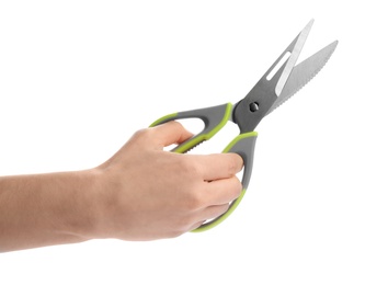 Woman holding kitchen scissors on white background, closeup