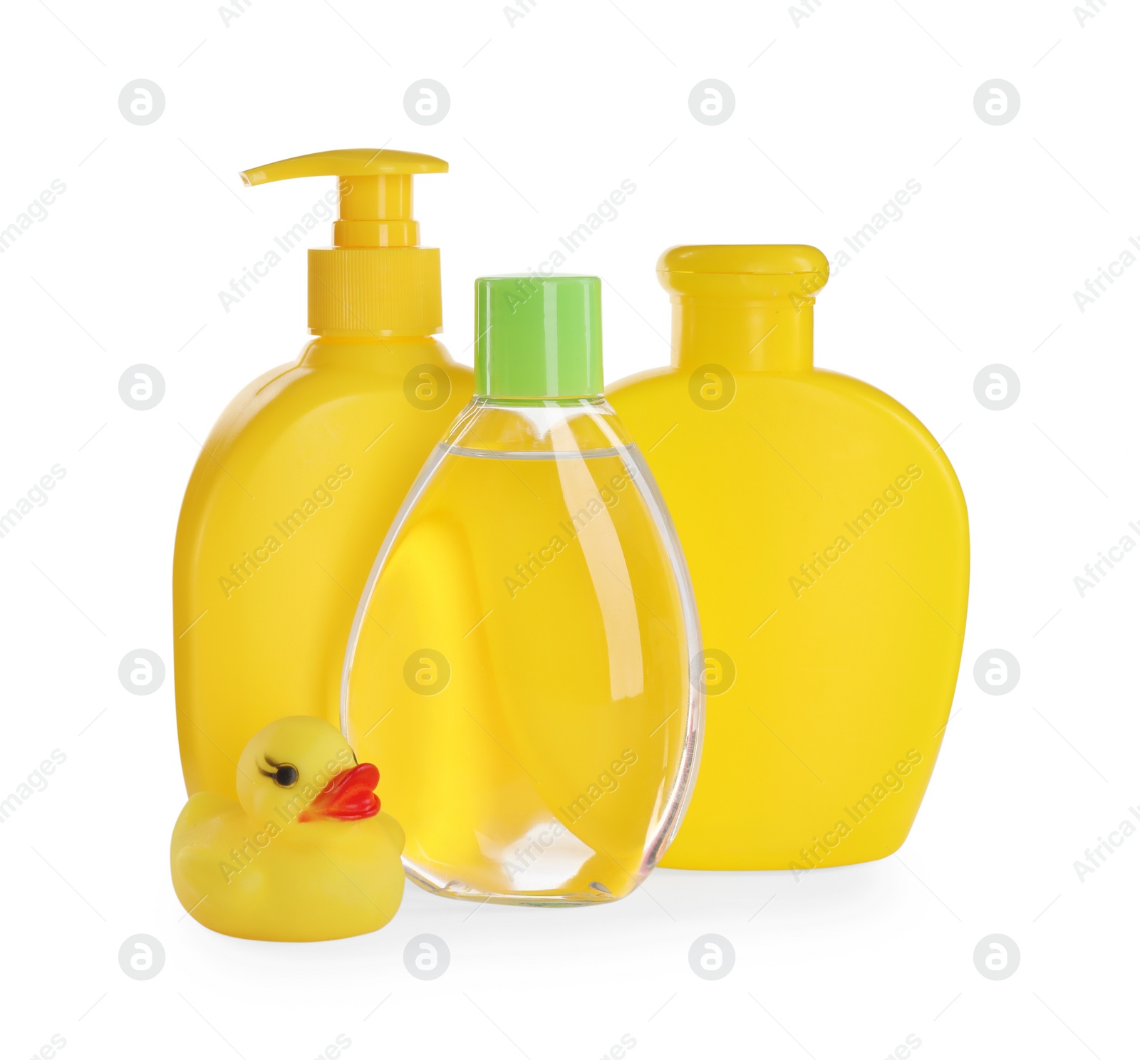 Photo of Bottle of baby oil, other cosmetic products and rubber duck on white background