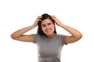 Photo of Emotional woman examining her hair and scalp on white background