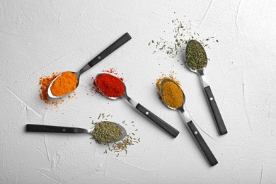 Photo of Flat lay composition with different aromatic spices on light background