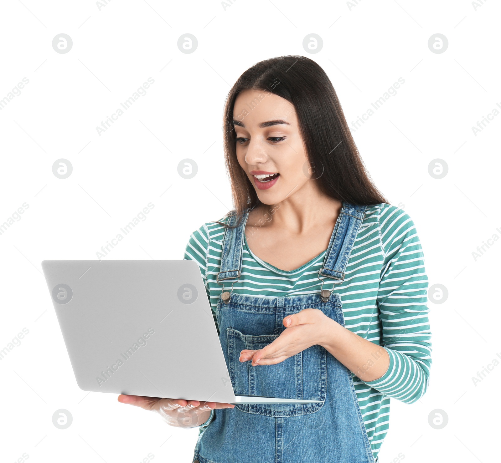 Photo of Portrait of young woman in casual outfit with laptop on white background