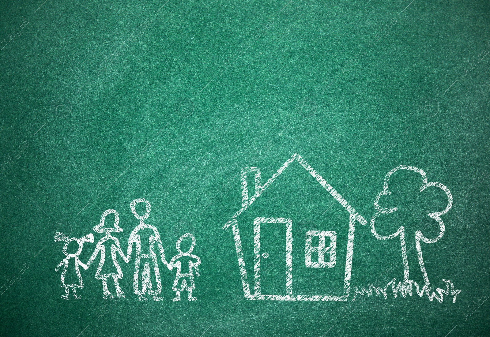 Image of House and family drawn with chalk on school board