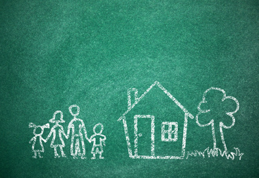 Image of House and family drawn with chalk on school board