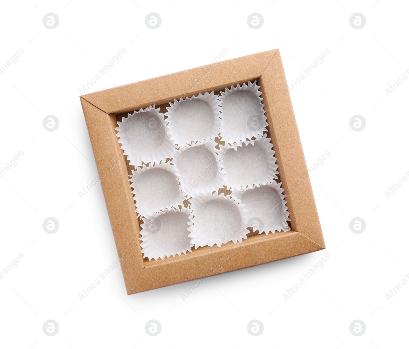 Photo of Empty box of chocolate sweets with candy paper cups isolated on white, top view