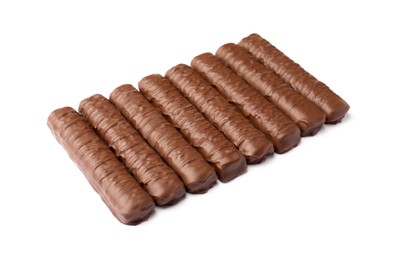 Photo of Sweet tasty chocolate bars on white background