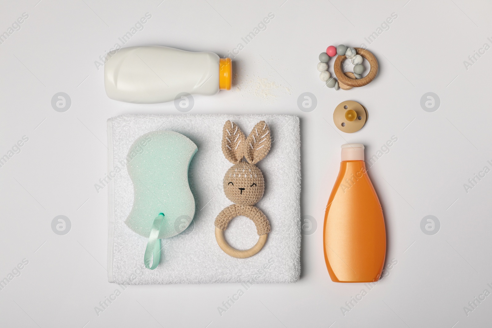 Photo of Flat lay composition with baby cosmetic products on white background