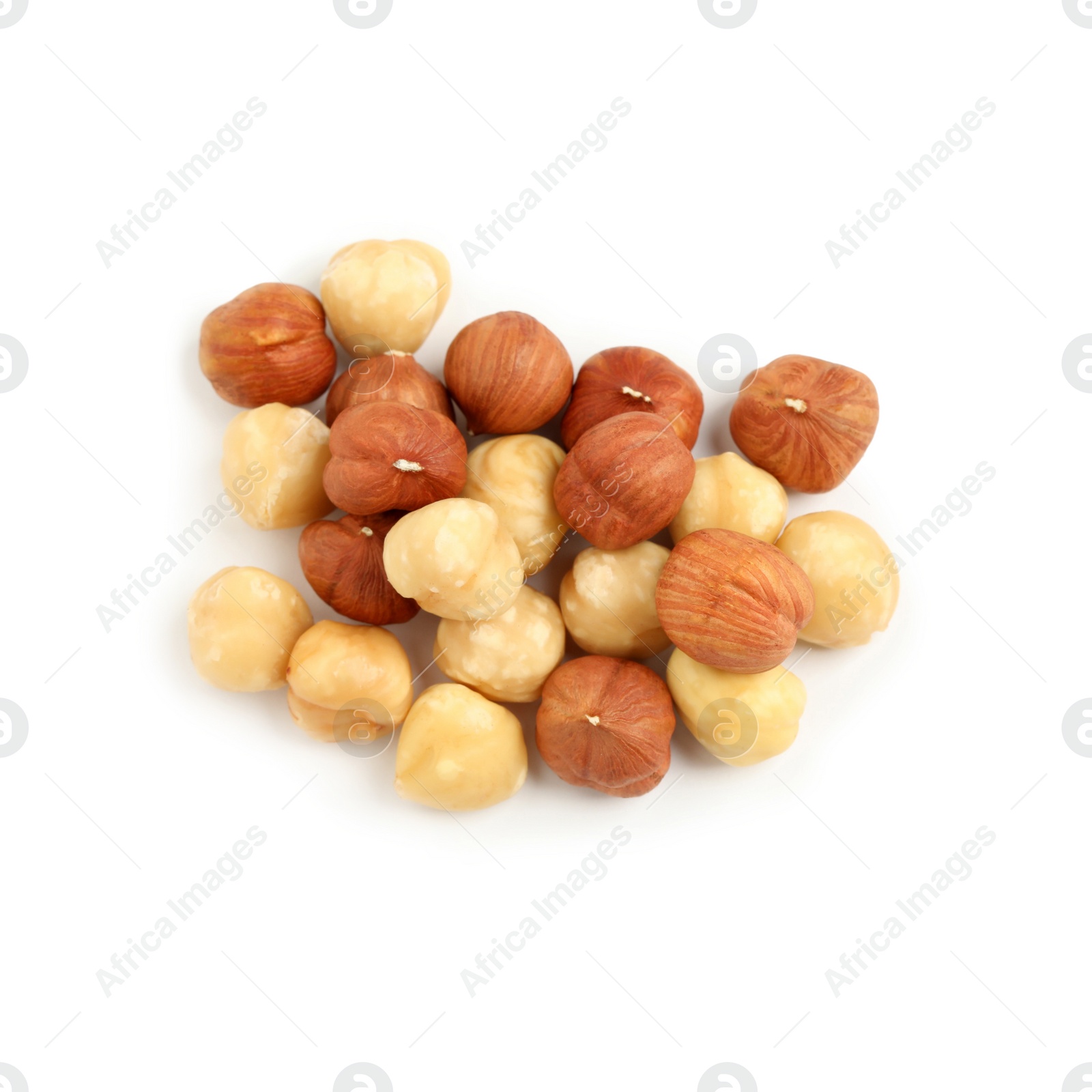 Photo of Heap of tasty hazelnuts on white background, top view