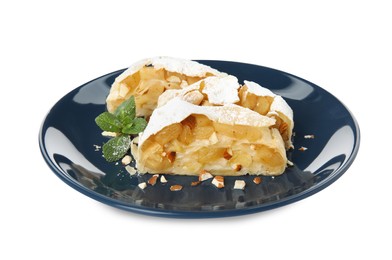 Photo of Delicious apple strudel with almonds, powdered sugar and mint on white background