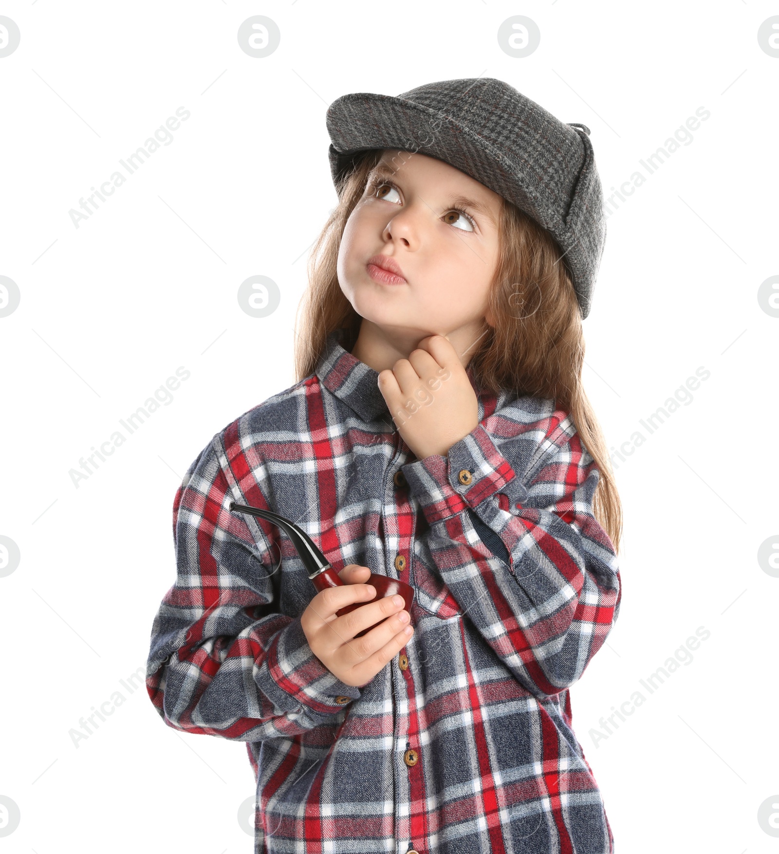 Photo of Cute little child in hat with smoking pipe playing detective on white background