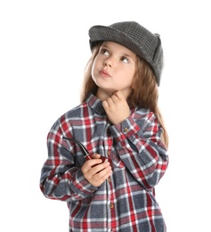 Cute little child in hat with smoking pipe playing detective on white background