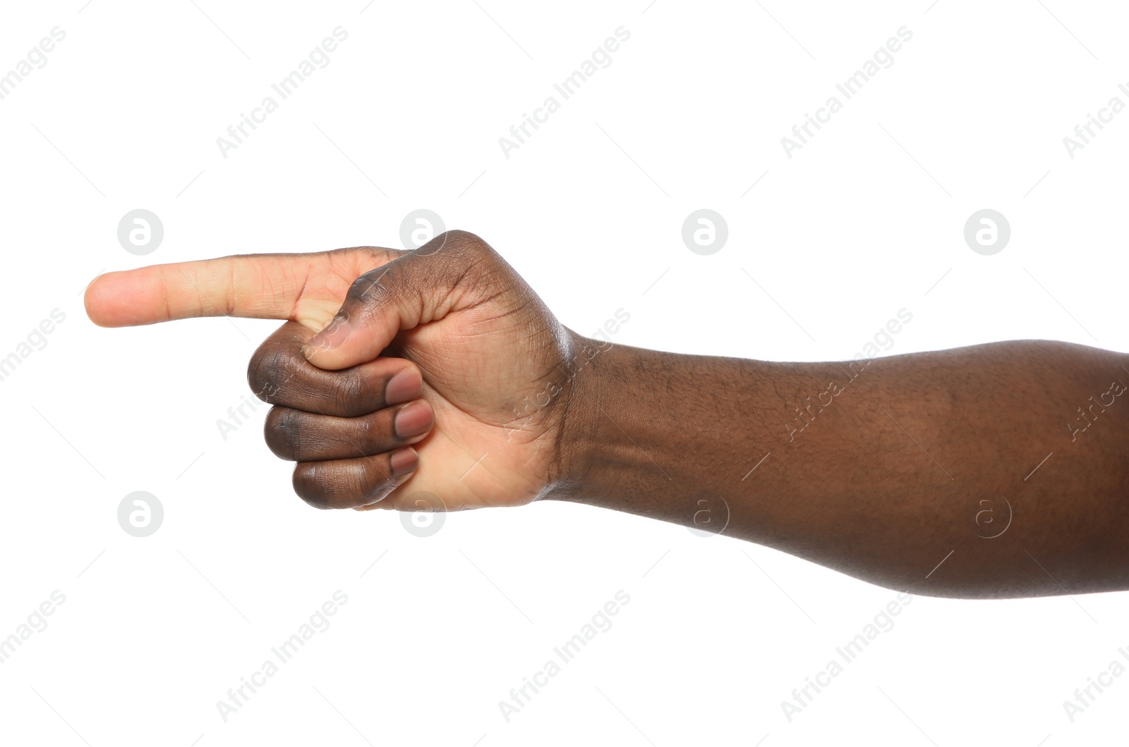 Photo of African-American man pointing at something on white background, closeup