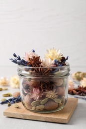 Photo of Aroma potpourri with different spices on white table