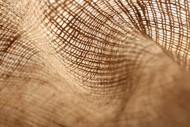 Texture of natural burlap fabric as background, closeup