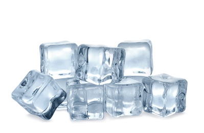 Photo of Pile of crystal clear ice cubes on white background