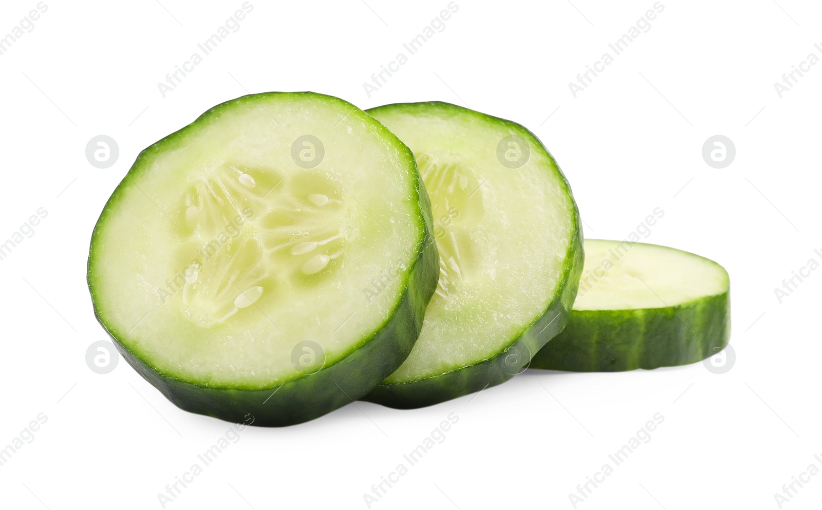 Photo of Slices of long cucumber isolated on white