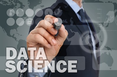 Data science. Man using digital screen, closeup