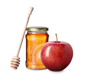 Image of Honey in glass jar, apple and dipper isolated on white