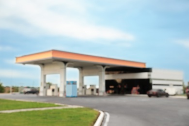 Photo of Blurred view of modern gas station outdoors
