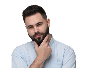 Portrait of young man with mustache on white background