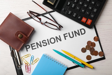 Photo of Composition with words PENSION FUND on wooden background, top view