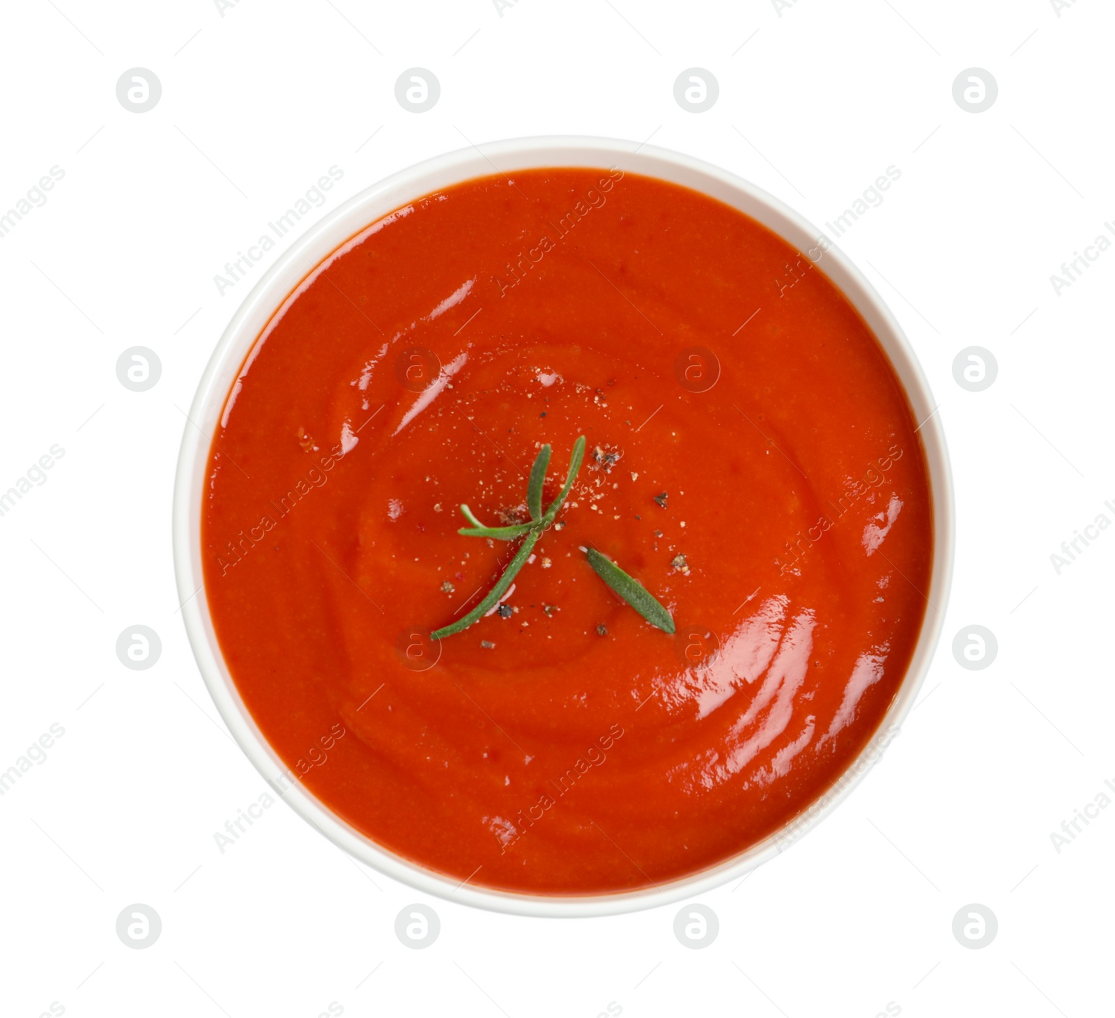 Photo of Bowl with fresh homemade tomato soup on white background, top view