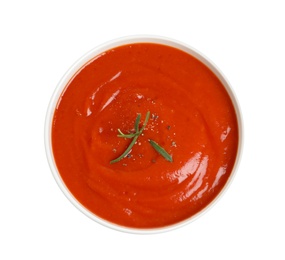 Bowl with fresh homemade tomato soup on white background, top view