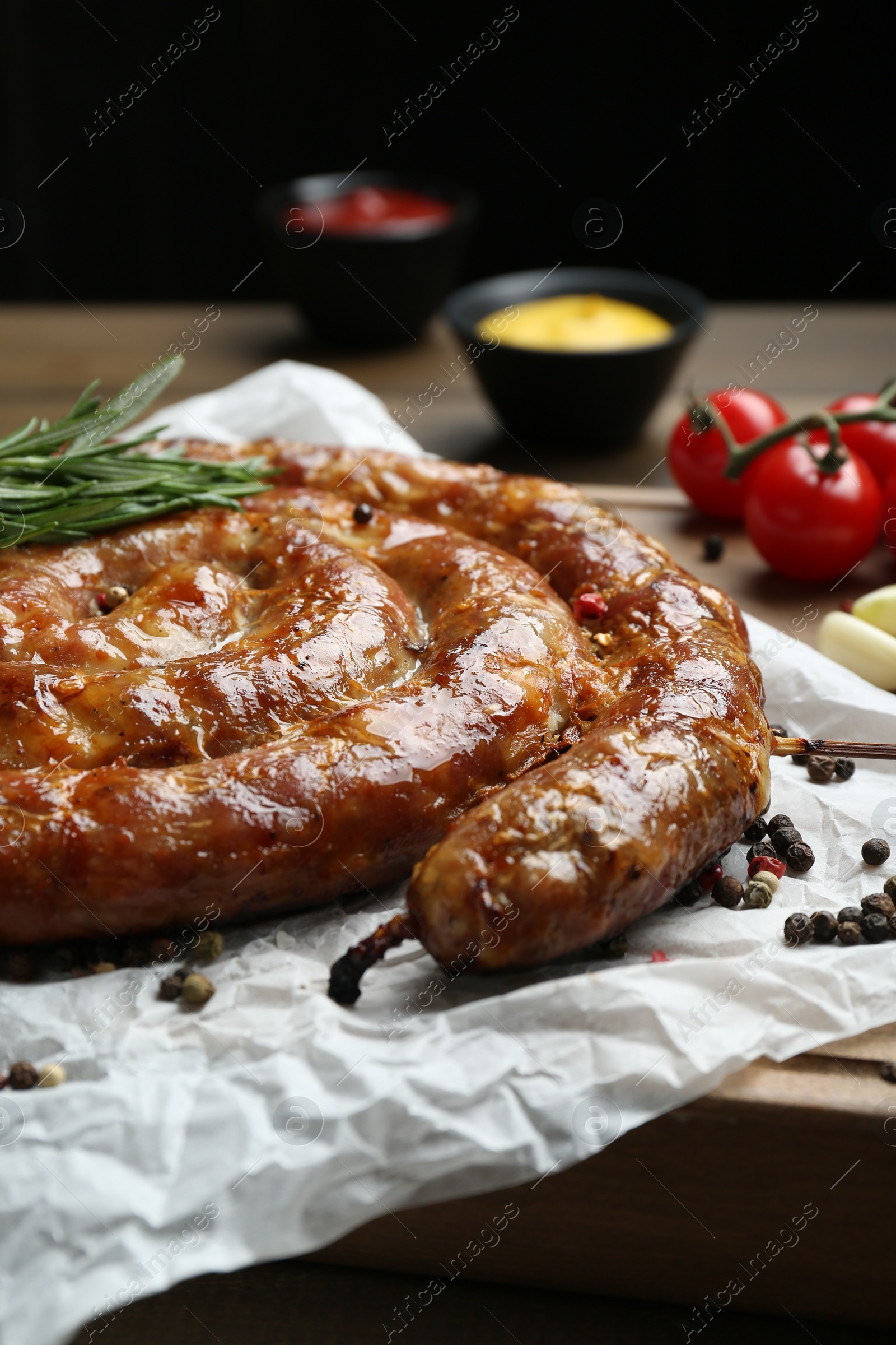 Photo of Delicious homemade sausage with spices served on table, closeup