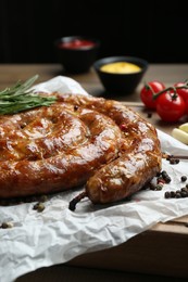 Photo of Delicious homemade sausage with spices served on table, closeup