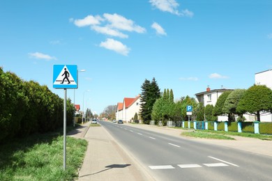 Photo of Traffic sign Pedestrian Crossing on city street