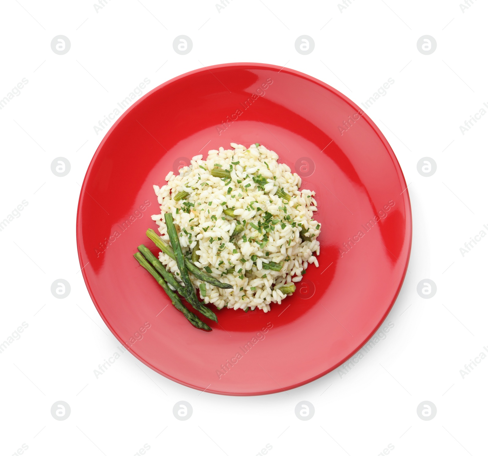 Photo of Delicious risotto with asparagus isolated on white, top view