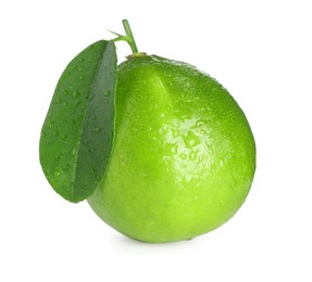 Photo of Wet green ripe lime with leaf isolated on white