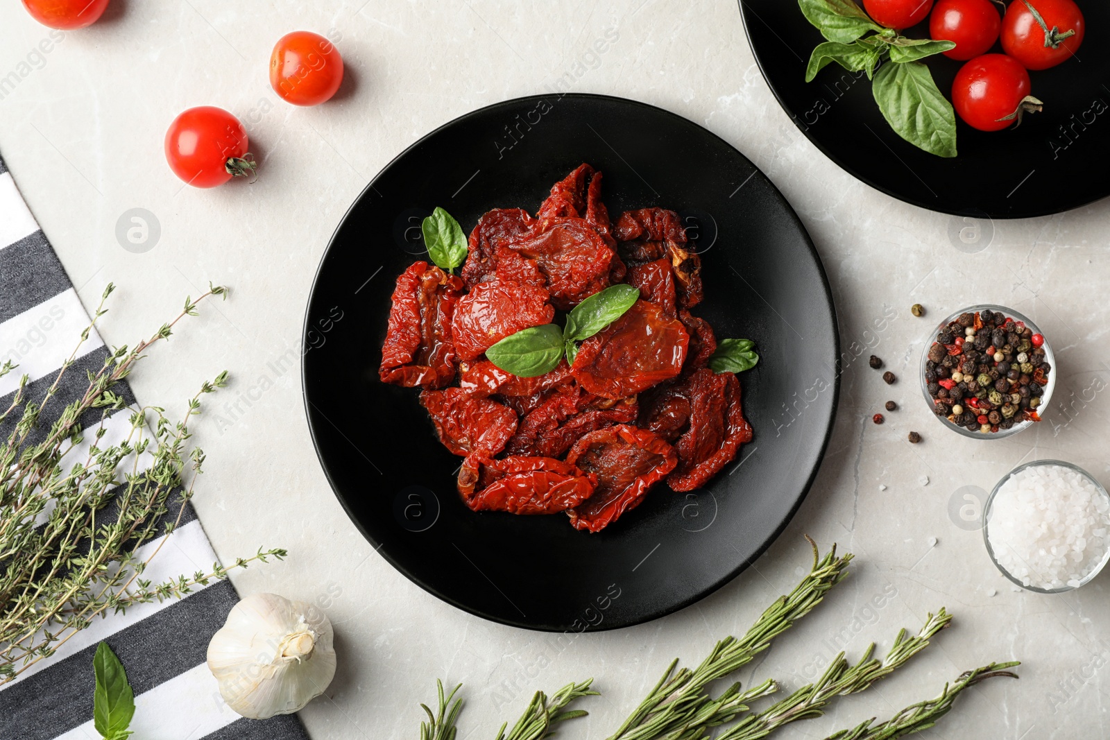 Photo of Flat lay composition with dried tomatoes on table