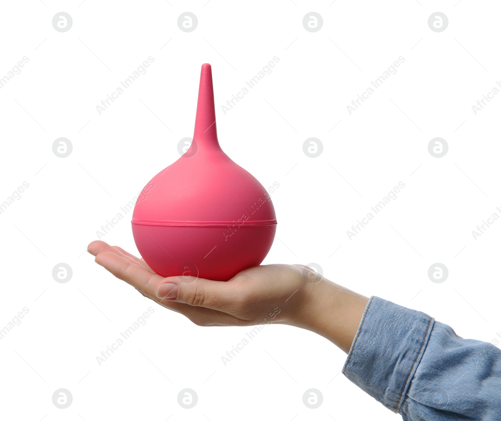 Photo of Woman holding pink enema on white background, closeup