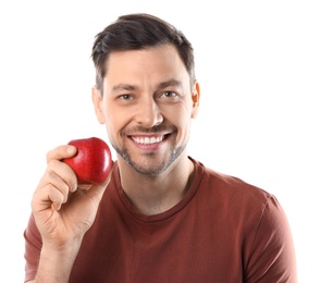 Smiling man with perfect teeth and red apple on white background