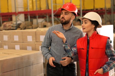 Image of Manager and supervisor at warehouse. Logistics center