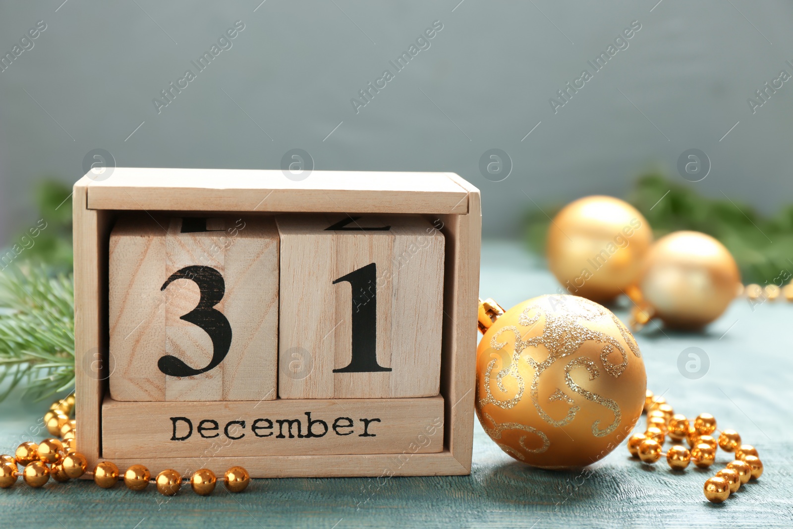 Photo of Wooden block calendar and decor on table. Christmas countdown