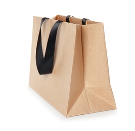 Paper shopping bag with handles isolated on white