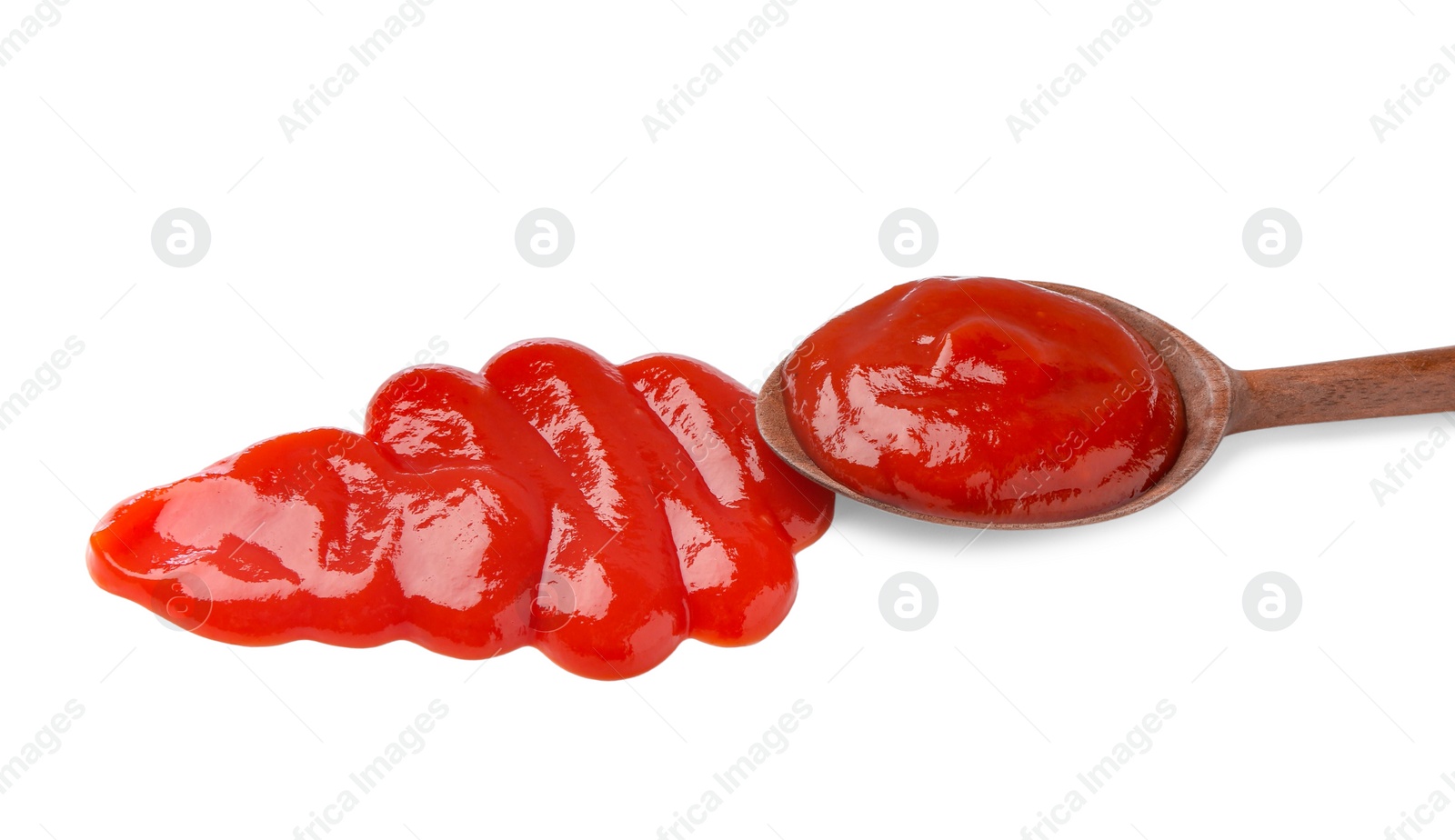 Photo of Tasty ketchup with wooden spoon isolated on white. Tomato sauce