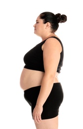 Fat woman on white background. Weight loss