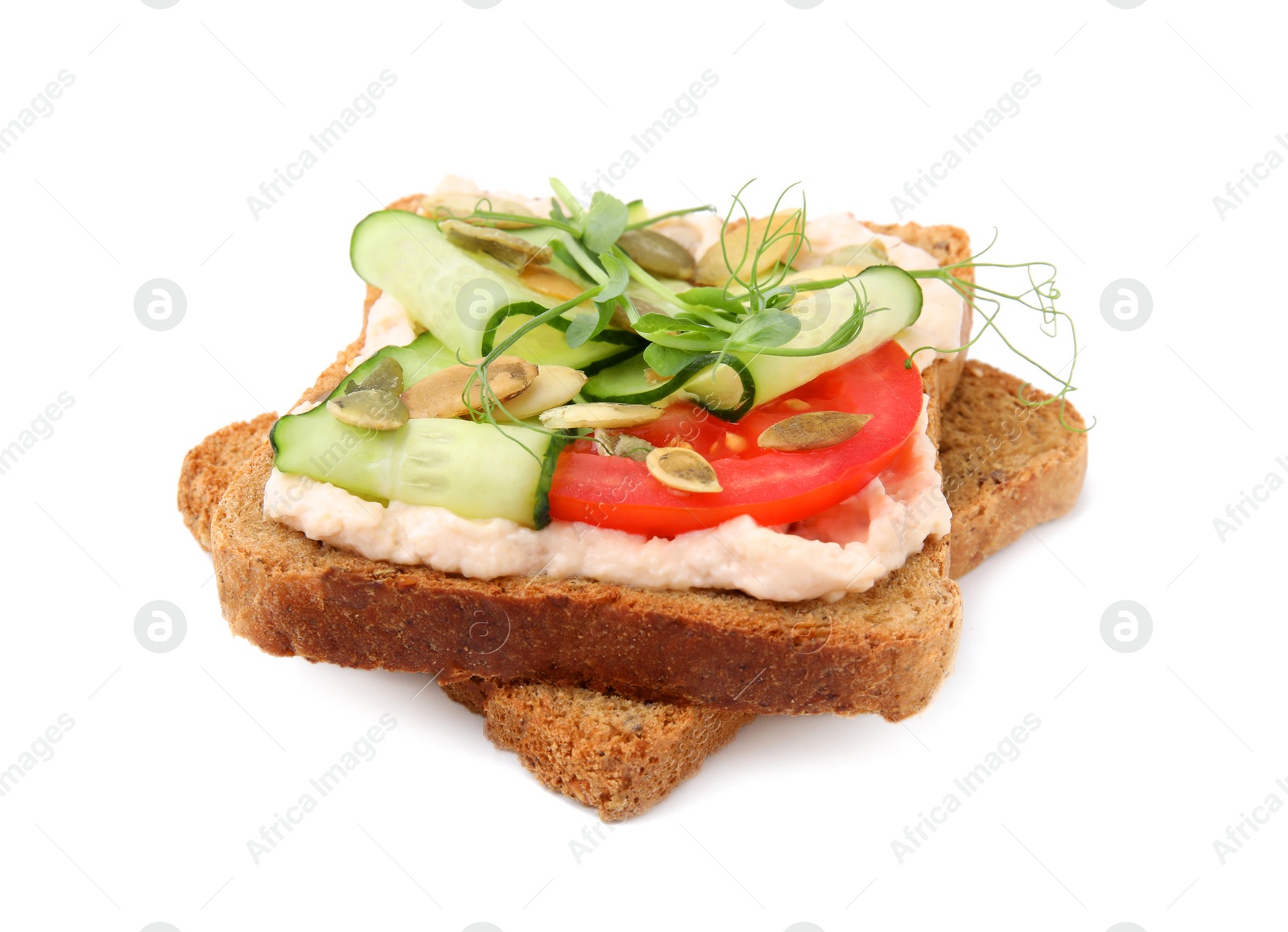 Photo of Tasty vegan sandwich with cucumber, tomato and pumpkin seeds isolated on white