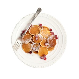 Photo of Delicious mini pancakes cereal with cranberries on white background, top view