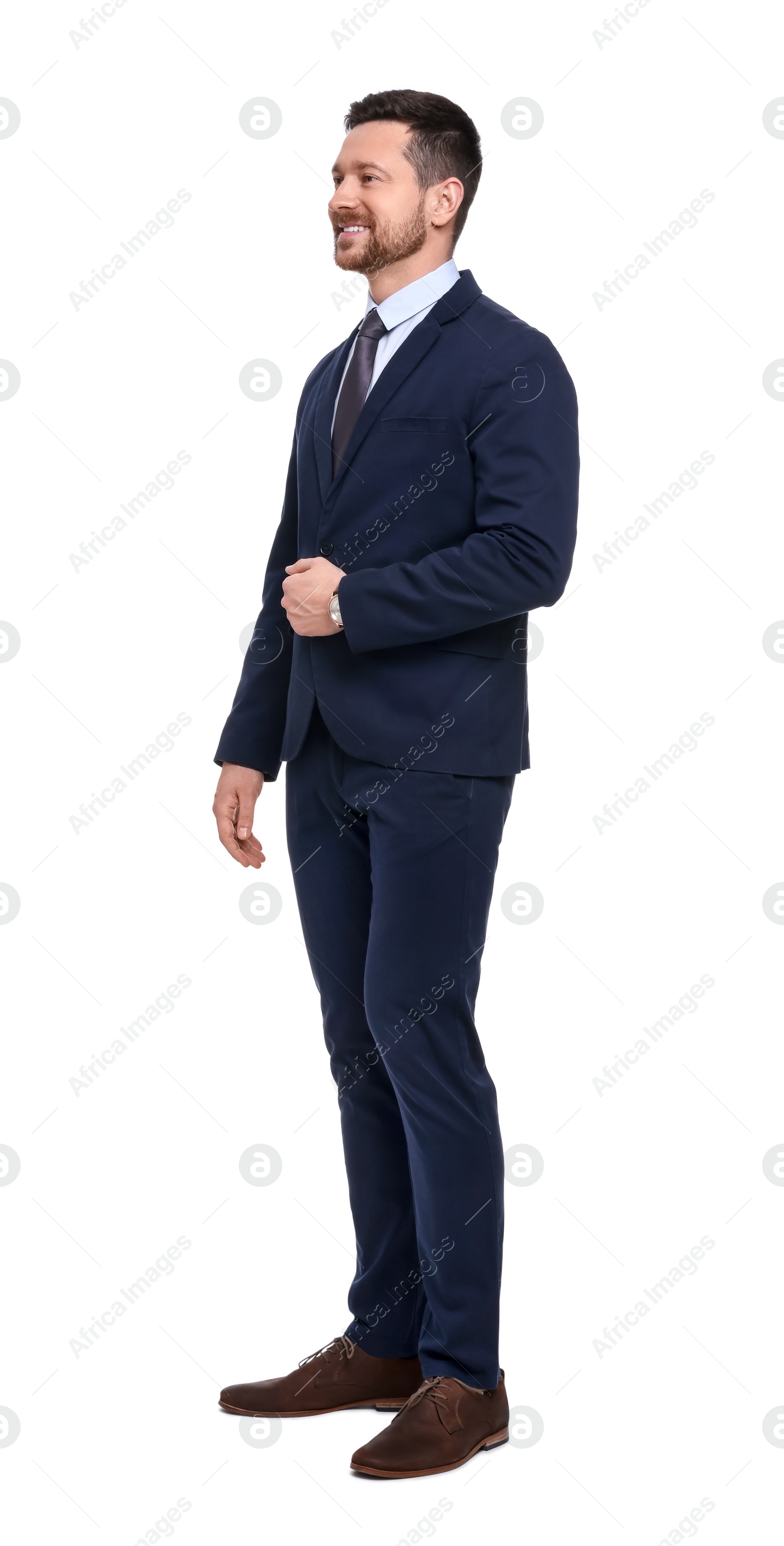 Photo of Handsome bearded businessman in suit on white background