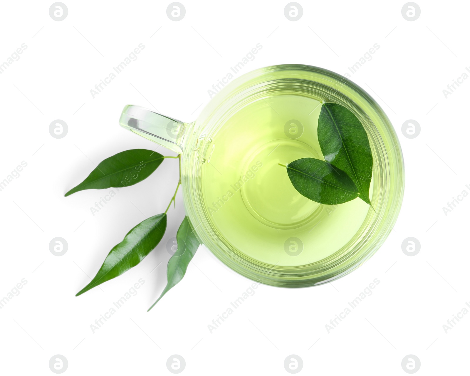 Photo of Cup of aromatic green tea and leaves isolated on white, top view