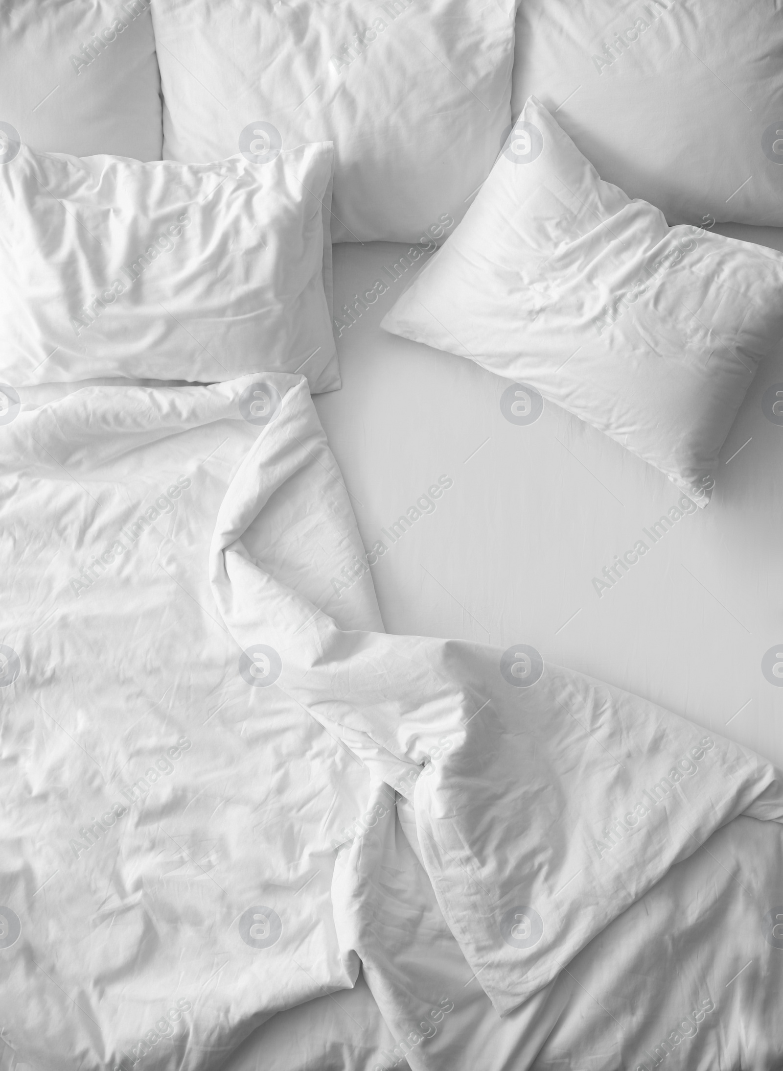 Photo of Soft pillows on comfortable bed, top view