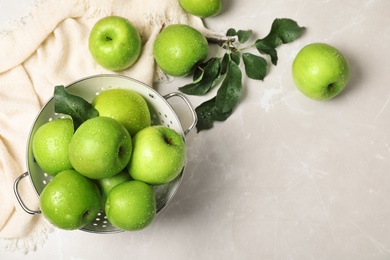 Photo of Composition with juicy green apples and space for text on table, top view